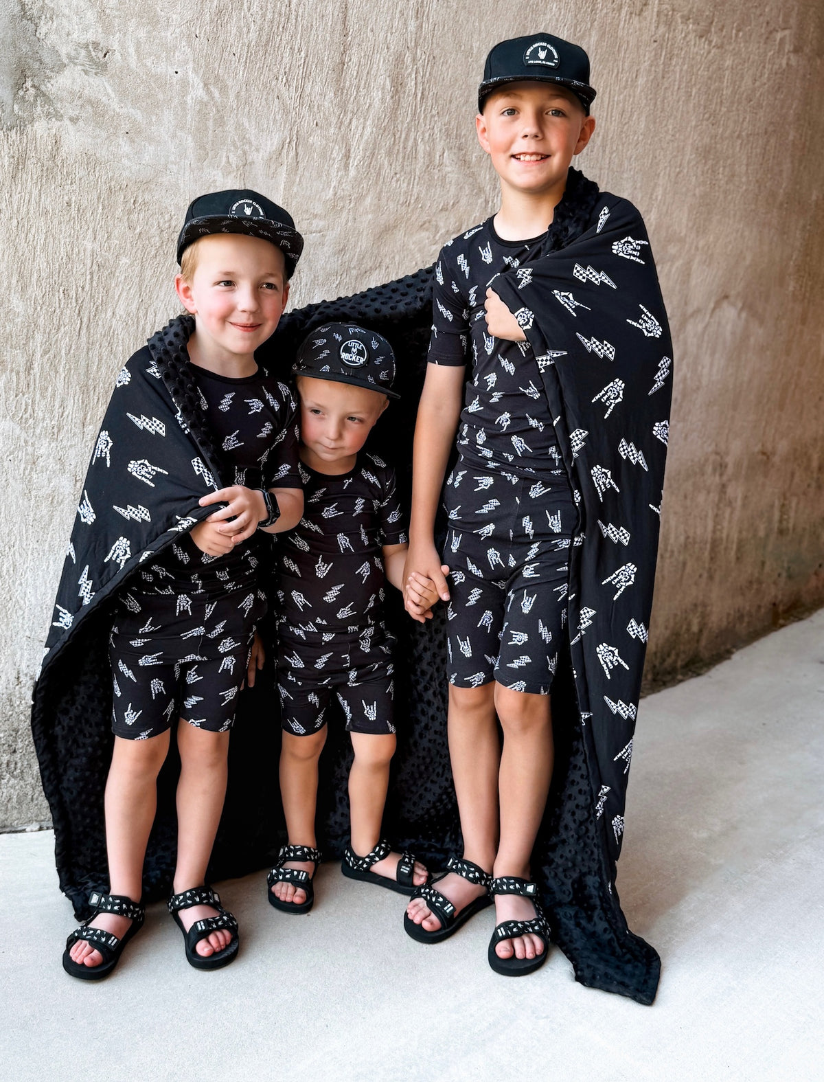 3 boys using bolted bones pattern minky blanket