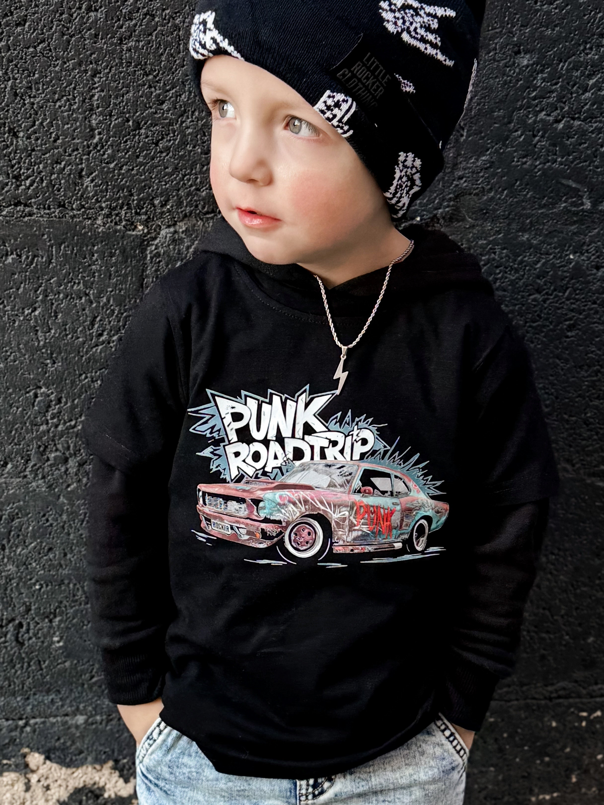 toddler boy wearing black kids graphic t-shirt with classic car and punk roadtrip graffiti style text, little rocker clothing rock style outfit