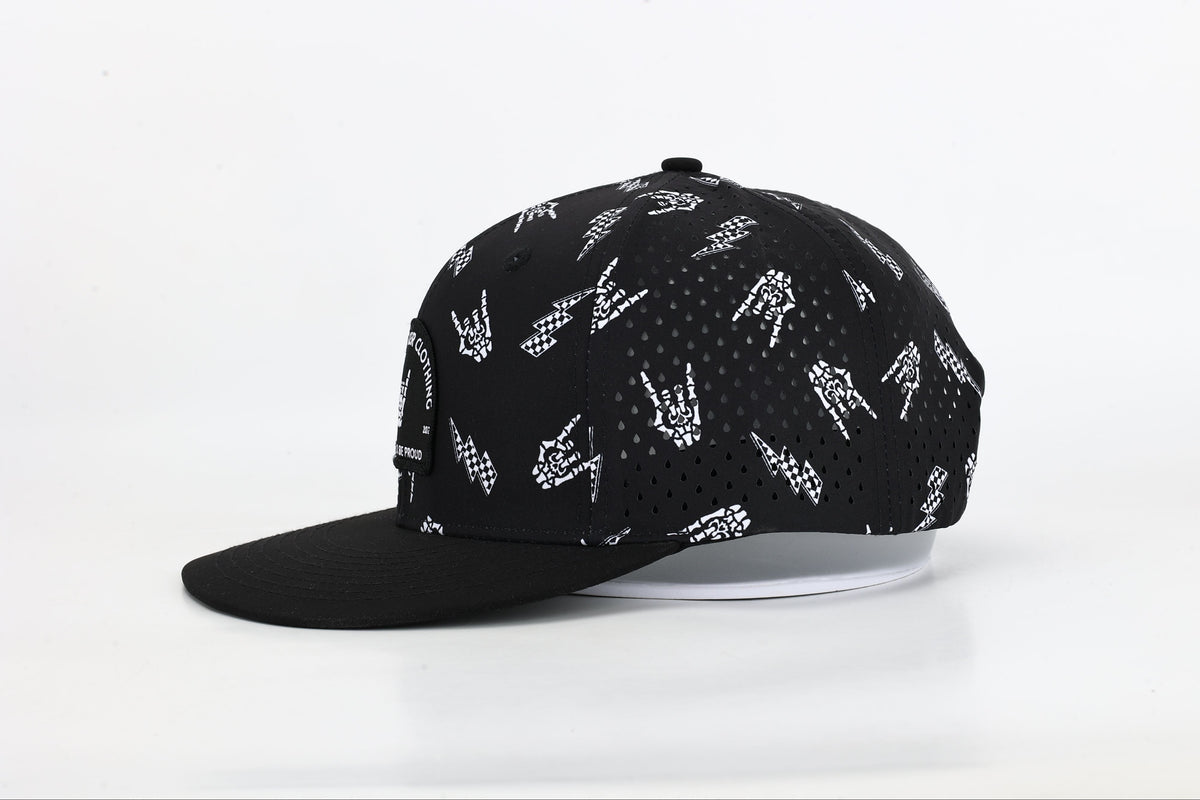 side view black snapback hat with allover bolted bones lightning bolt and rock hand print little rocker clothing patch flat brim adjustable cap for kids and adults