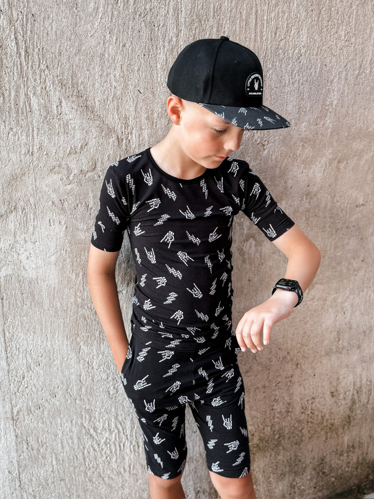 pre teen boy wearing bolted bones 2 piece bamboo pajamas for kids