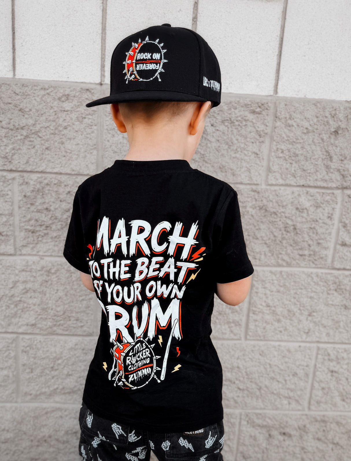 Frank Zummo Collab shirt featuring march to the beat of your own drum, rocker inspired graphic tee with soft comfortable fit, oversized style available in kids infant onesie up to
