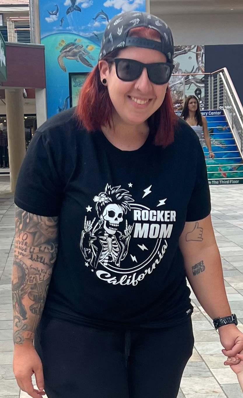 adult wearing black graphic t-shirt with rocker mom california, little rocker clothing rock style outfit