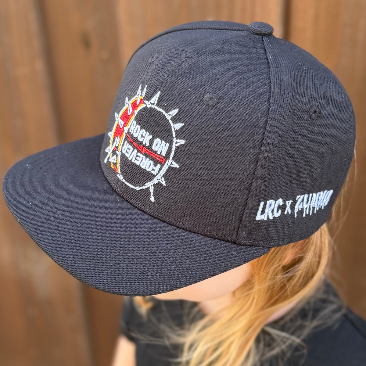 Frank Zummo collaboration with Little Rocker Clothing snapback hat with drum graphic and rock on forever phrase, edgy rock style kids hat with adjustable fit, music inspired youth apparel accessory