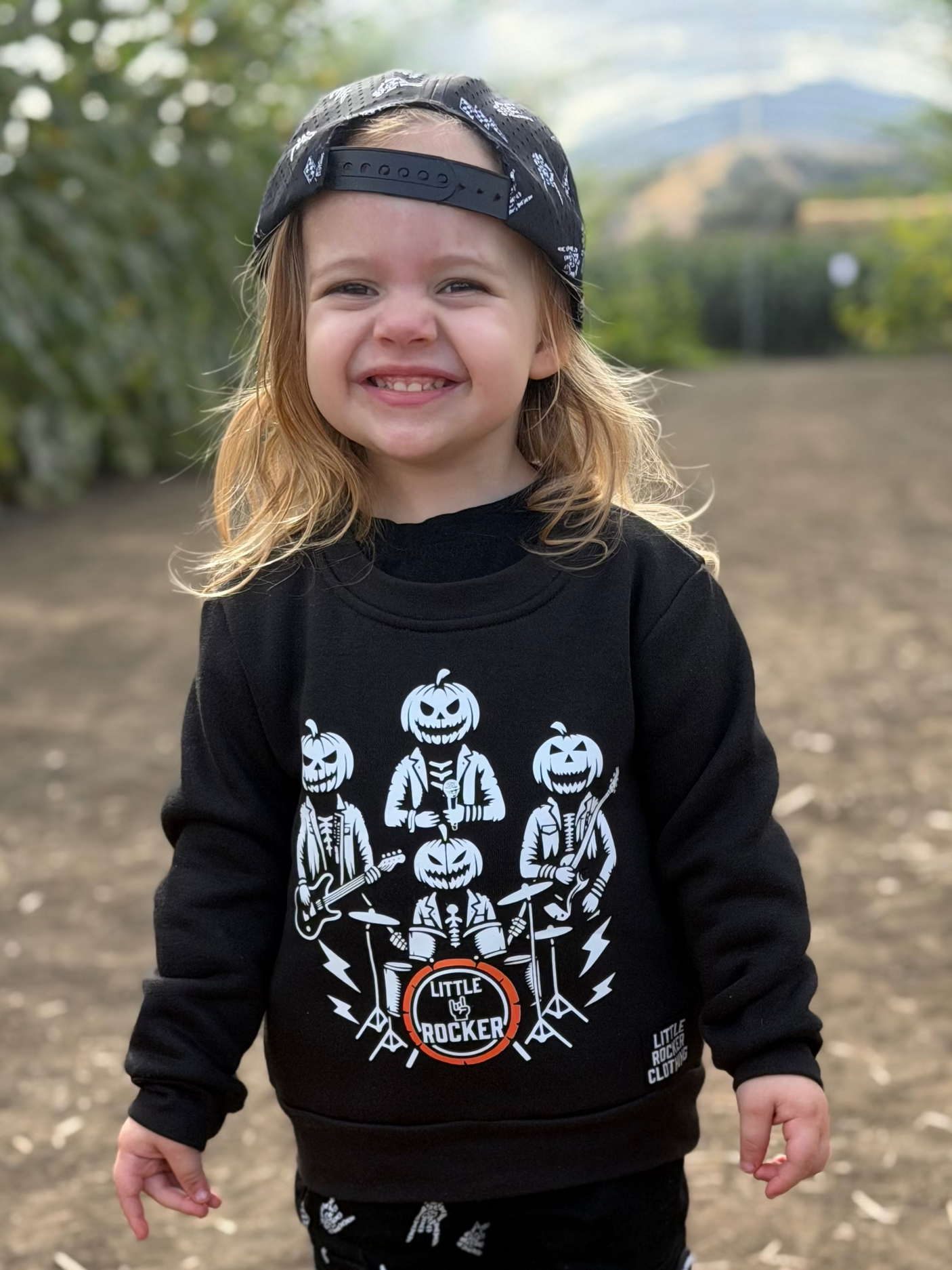 Toddler wearing rock music inspired halloween crew neck from little rocker clothing