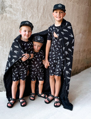 3 boys using bolted bones pattern minky blanket