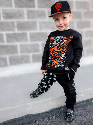Kid wearing the scene sampler crew neck sweatshirt for kids and adults with pop punk alt rock metal emo graphic design, rocker style apparel, little rocker clothing