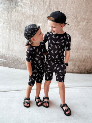 2 young boys wearing bolted bones 2 piece bamboo pajamas for kids