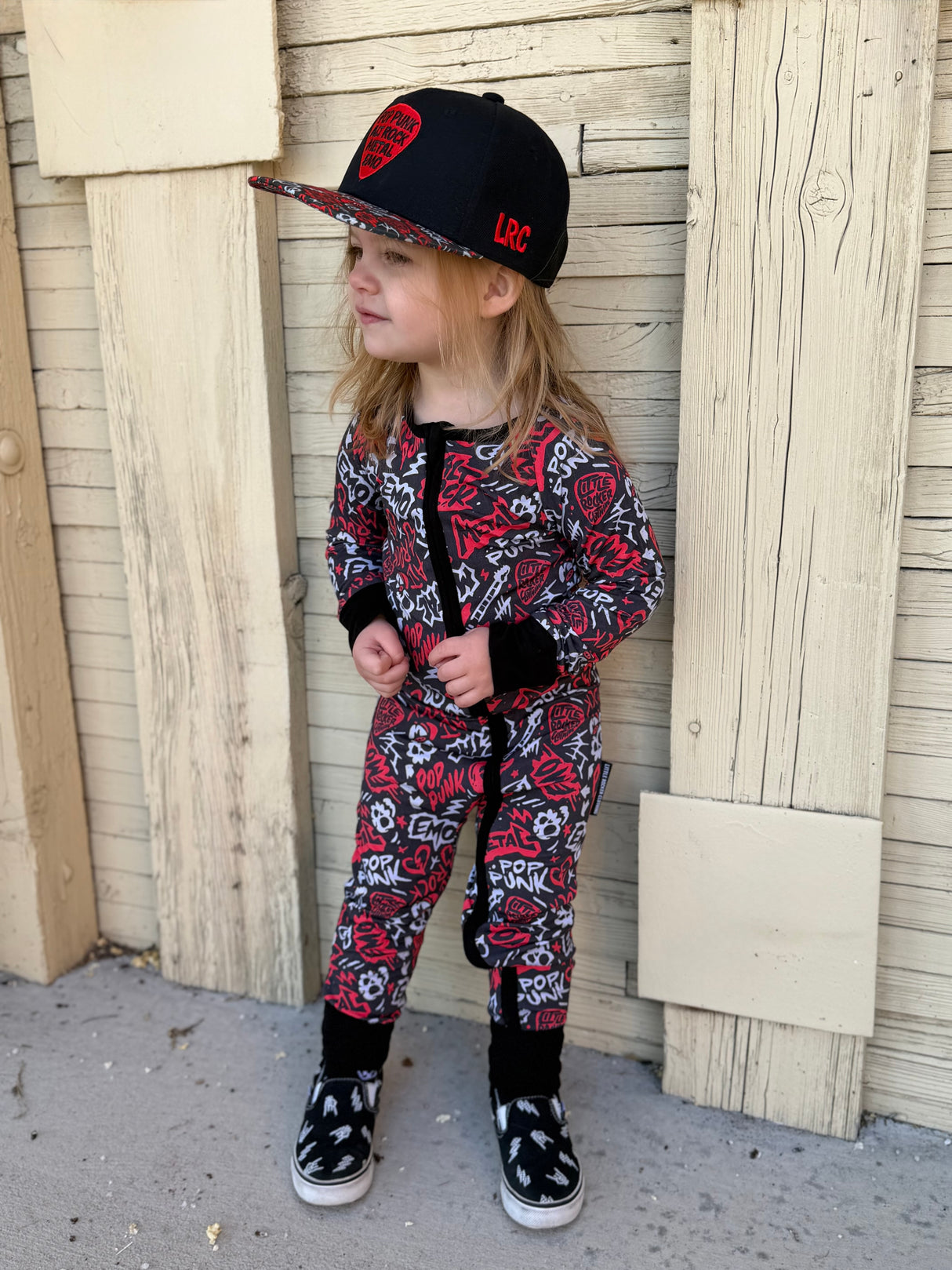 Red and Black bamboo pajama set with long sleeves and full length pants, featuring an edgy rock inspired print, made from ultra soft breathable bamboo fabric with a stretchy comfortable fit for babies and kids up to 3T