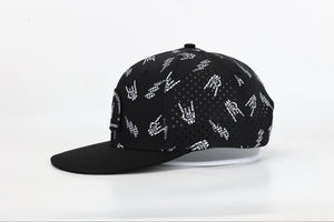 side view black snapback hat with allover bolted bones lightning bolt and rock hand print little rocker clothing patch flat brim adjustable cap for kids and adults