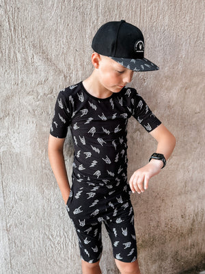 pre teen boy wearing bolted bones 2 piece bamboo pajamas for kids