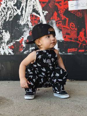 infant wearing kids black bolted bones overalls with lightning bolt and rock hand print matching outfits toddler streetwear little rocker clothing