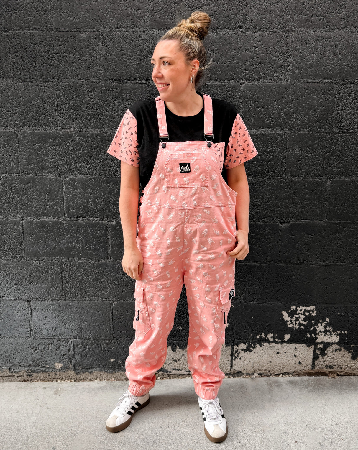 adult wearing pink bolted bones overalls for matching family outfits and alternative style from Little Rocker Clothing