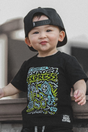 Infant wearing the Kids black chaos express t-shirt featuring rock inspired graphic with train illustration on a graphic tee, rocker style kids apparel