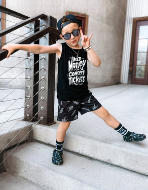 Edgy kid giving the horns wearing graphic tank top that says need money for concert tickets black rocker style sleeveless shirt for kids summer outfit sizes toddler to youth