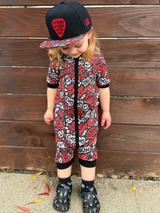 Black and Red baby shortie pajamas featuring an edgy rock-inspired print, made from ultra-soft breathable fabric, designed for babies and toddlers up to size 5T with a comfy stretchy fit and short sleeves for warmer nights