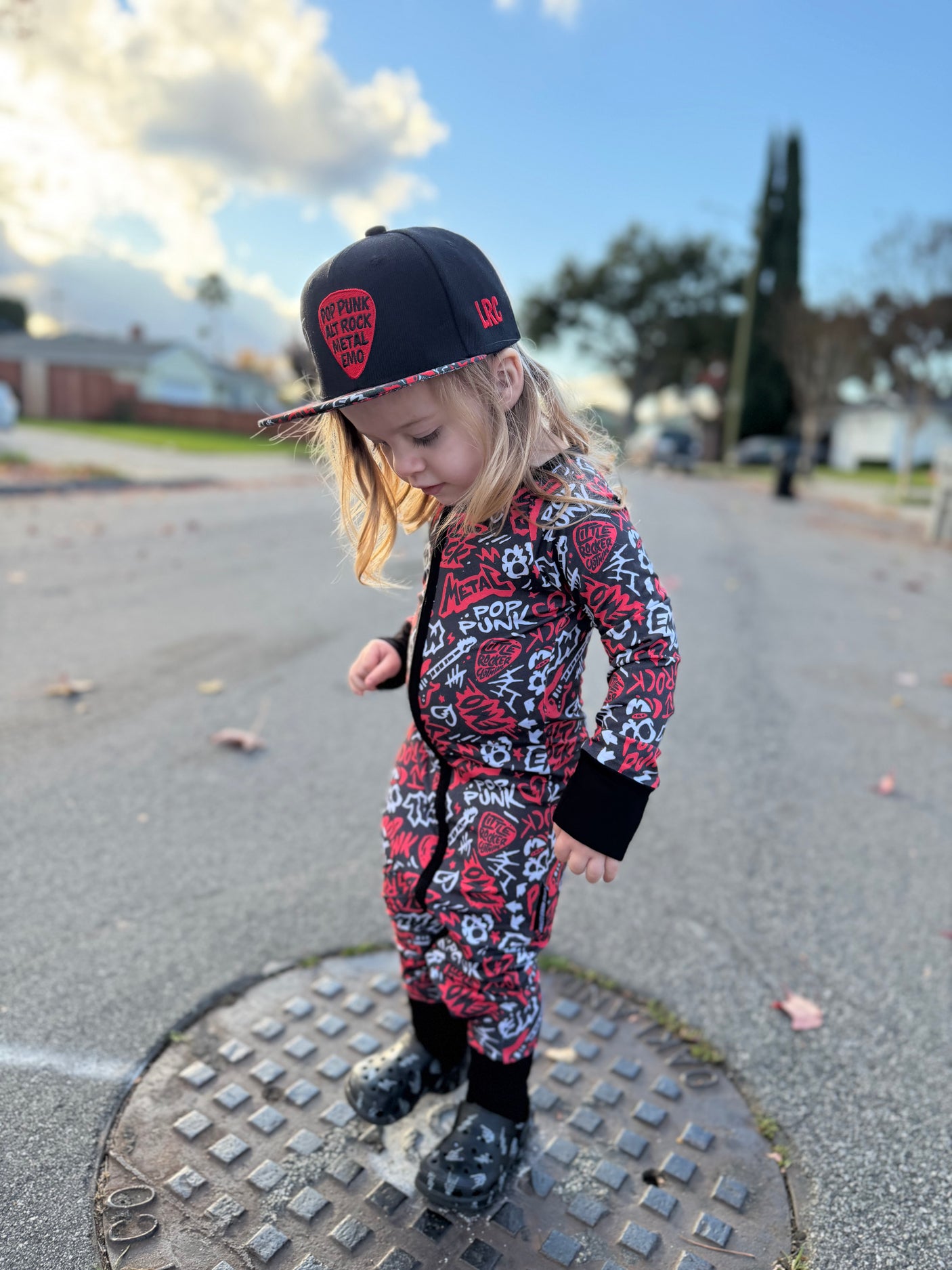 Red and Black bamboo pajama set with long sleeves and full length pants, featuring an edgy rock inspired print, made from ultra soft breathable bamboo fabric with a stretchy comfortable fit for babies and kids up to 3T