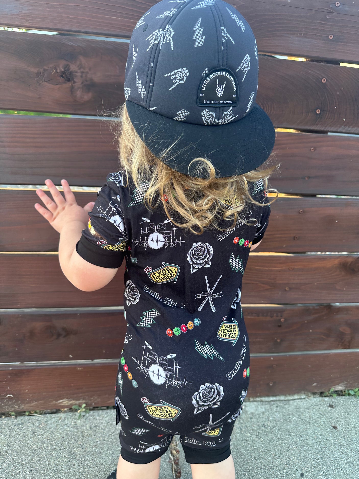 back side of emo nights pattern short sleeve zip up pajamas for kids
