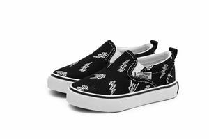 bolted bones canvas slip on shoes for kids with black and white skull and lightening bolt pattern, rocker style kids sneakers, elastic slip on design, little rocker clothing footwear