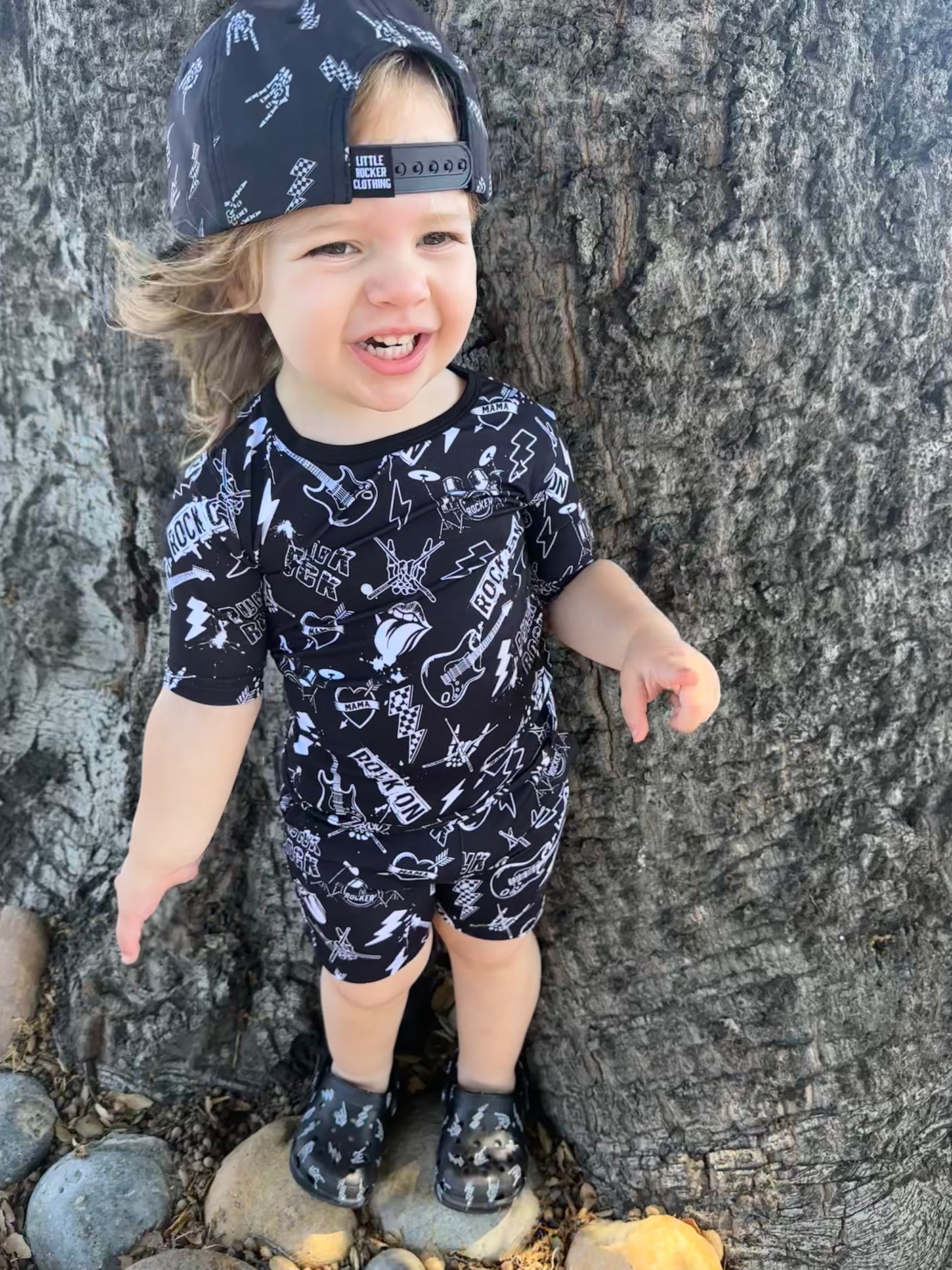 toddler girl wearing punk rock collage 2 piece bamboo pajamas for kids