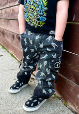 black washed baggy jeans for kids with skull print from Little Rocker Clothing alternative kids clothing and streetwear style