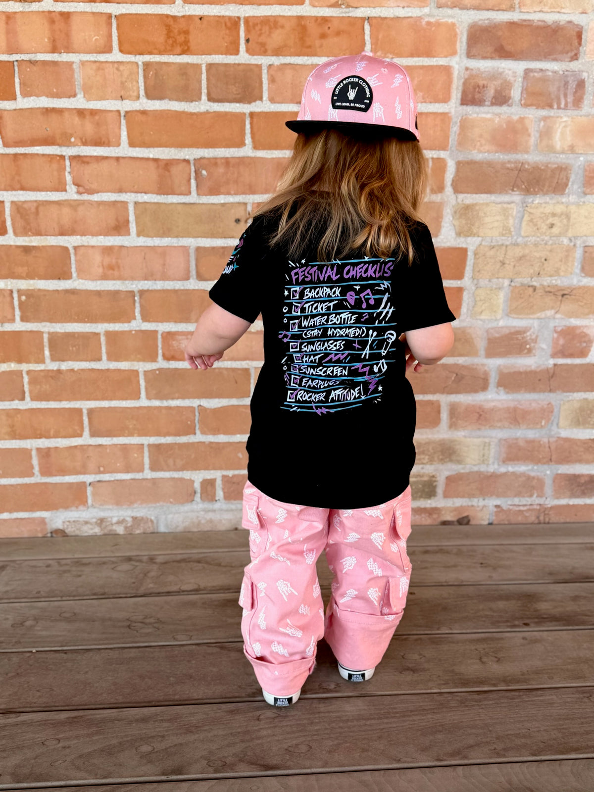 The coolest kids streetwear tshirt is the Festival checklist shirt for kids featuring concert inspired graphic design, rocker style kids tee with soft comfortable fit, available from infant onesie to size 10/12