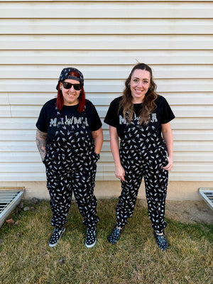 black bolted bones overalls for adults shown with matching kids outfit styled for edgy outfits and everyday wear