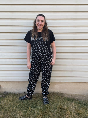 black bolted bones overalls for adults styled as edgy outfits and rock inspired clothing from Little Rocker Clothing