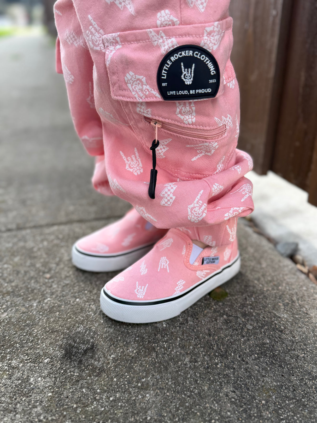 front close up view of the pink bolted bones canvas shoes for kids from little rocker clothing