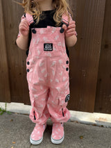 close up of pink bolted bones overalls from little rocker clothing 
