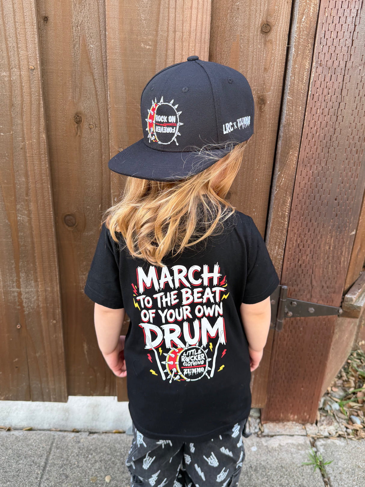 Frank Zummo collaboration with Little Rocker Clothing snapback hat with drum graphic and rock on forever phrase, edgy rock style kids hat with adjustable fit, music inspired youth apparel accessory