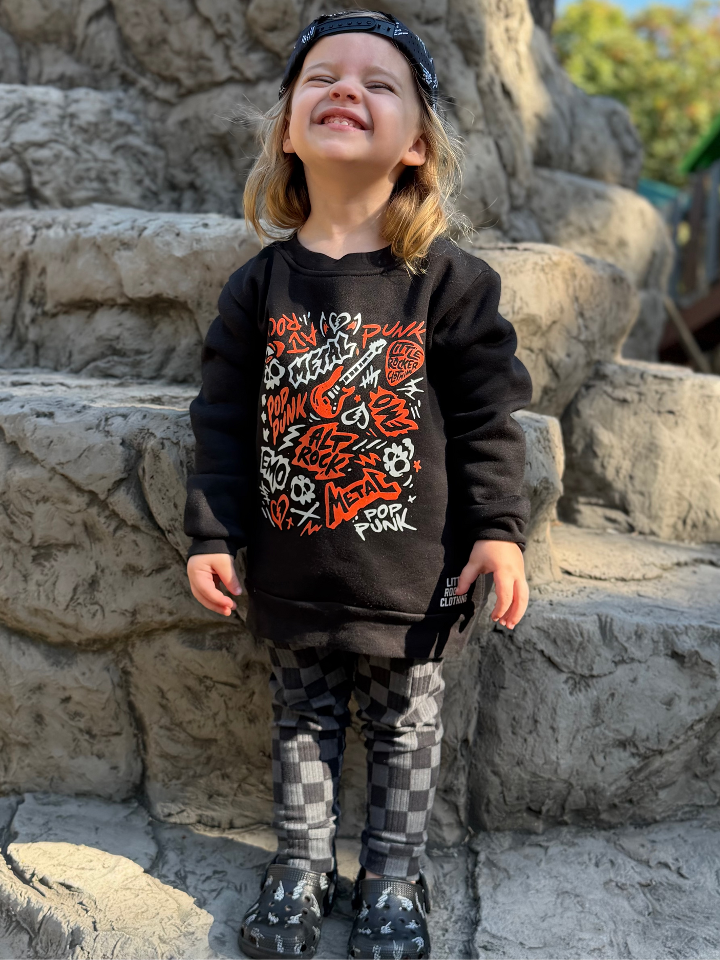 Toddler wearing the scene sampler crew neck sweatshirt for kids and adults with pop punk alt rock metal emo graphic design, rocker style apparel, little rocker clothing