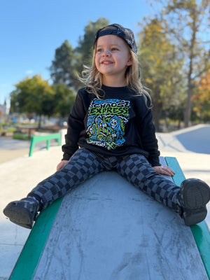 Toddler playing outside in the Kids black Scene Sampler crew neck sweatshirt featuring pop punk, emo, and alt rock graphic with train illustration, rocker style kids apparel