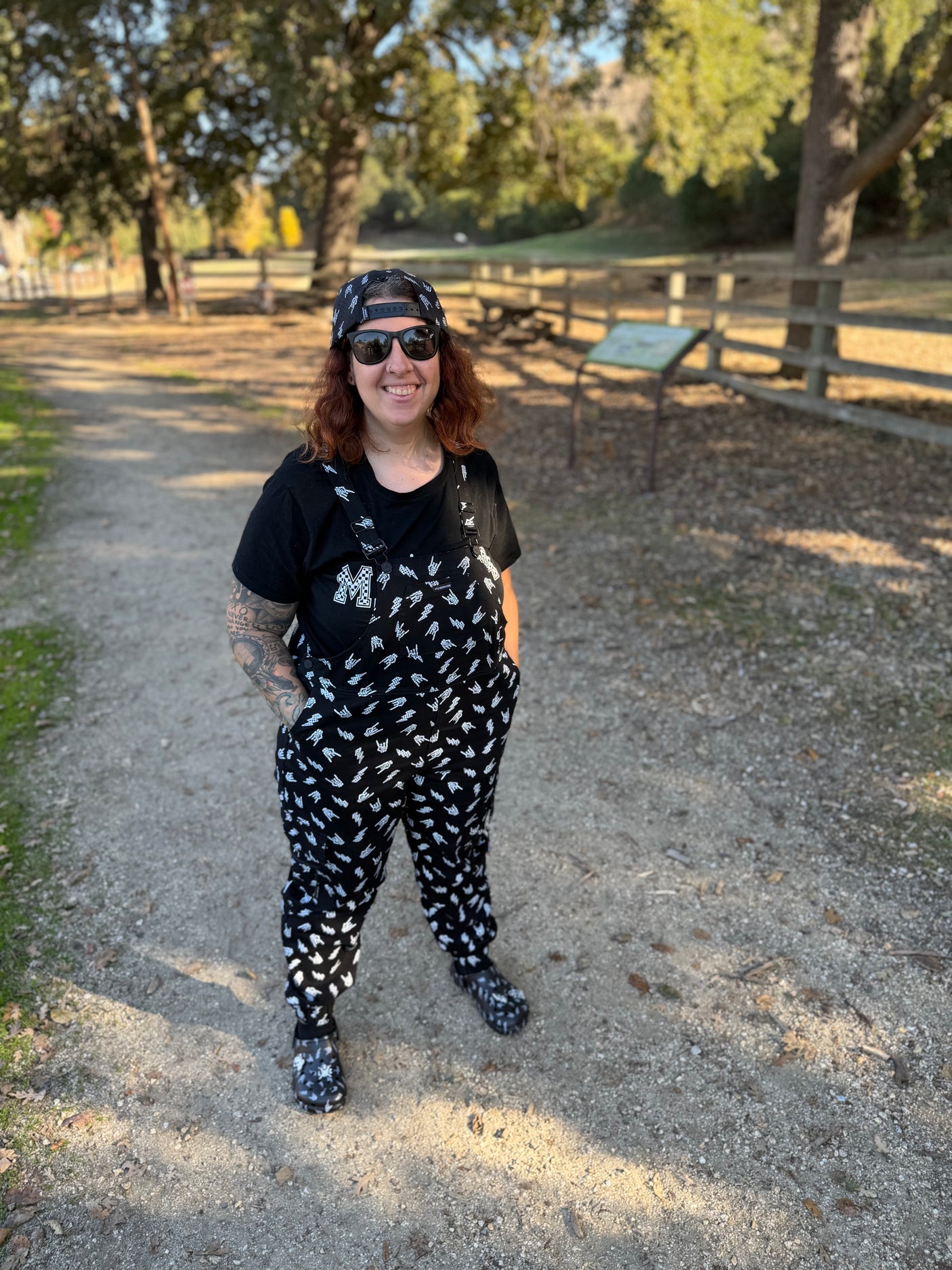 black bolted bones overalls for adults shown with matching kids outfit styled for edgy outfits and everyday wear