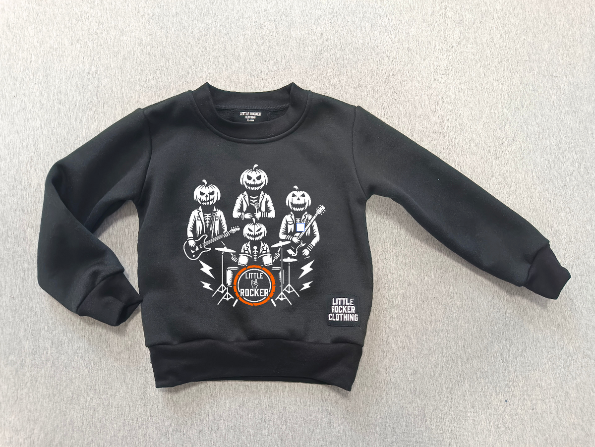 Layflat of rock music inspired halloween crew neck featuring a band of pumpkin heads from little rocker clothing