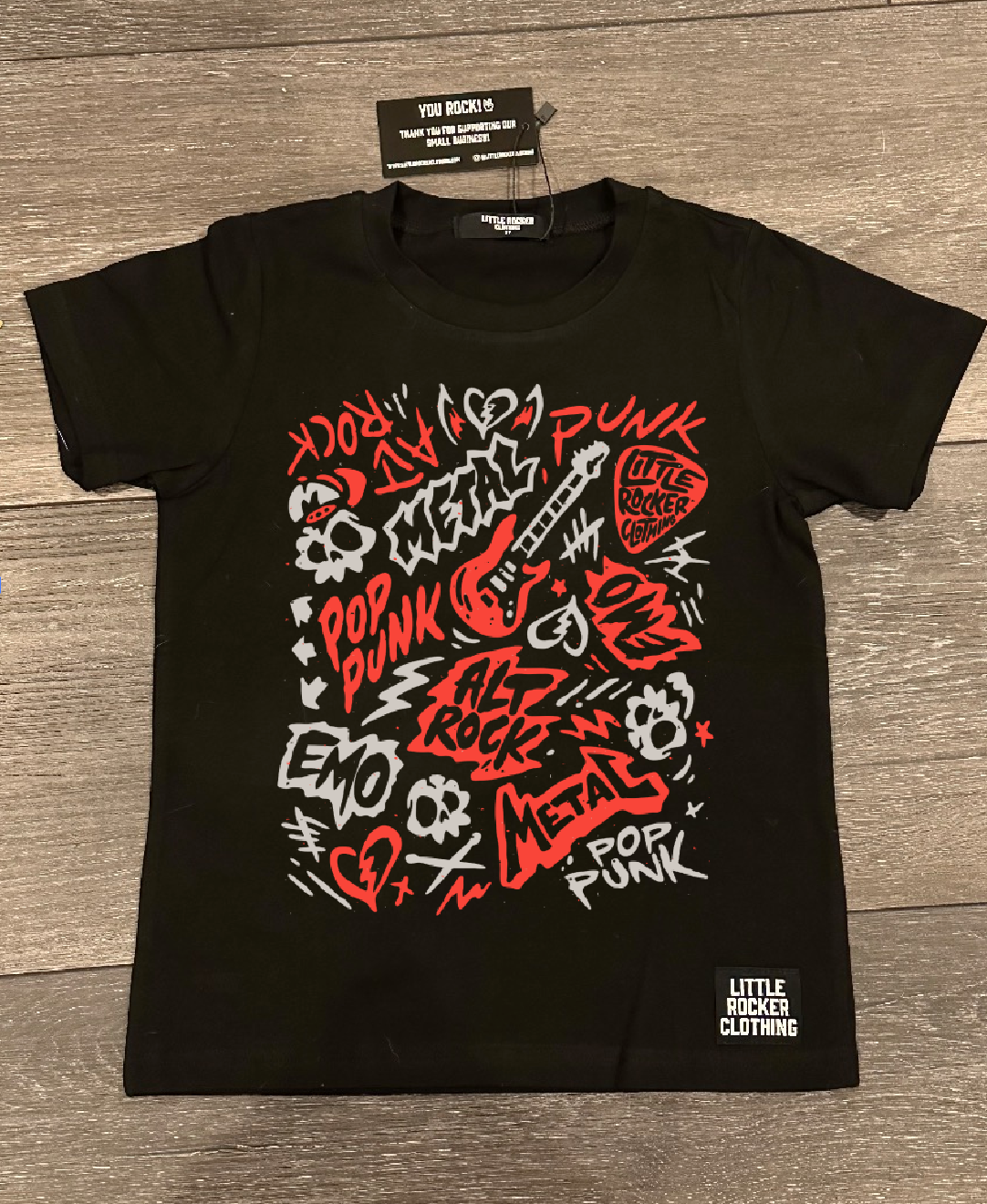 Lay flat of the scene sampler tee for kids and adults with pop punk alt rock metal emo graphic design, rocker style apparel, little rocker clothing