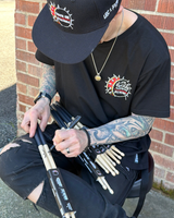 Frank Zummo Autographing little rocker clothing drumsticks