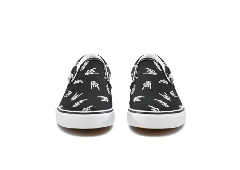 close up bolted bones canvas slip on shoes textured fabric skull pattern detail